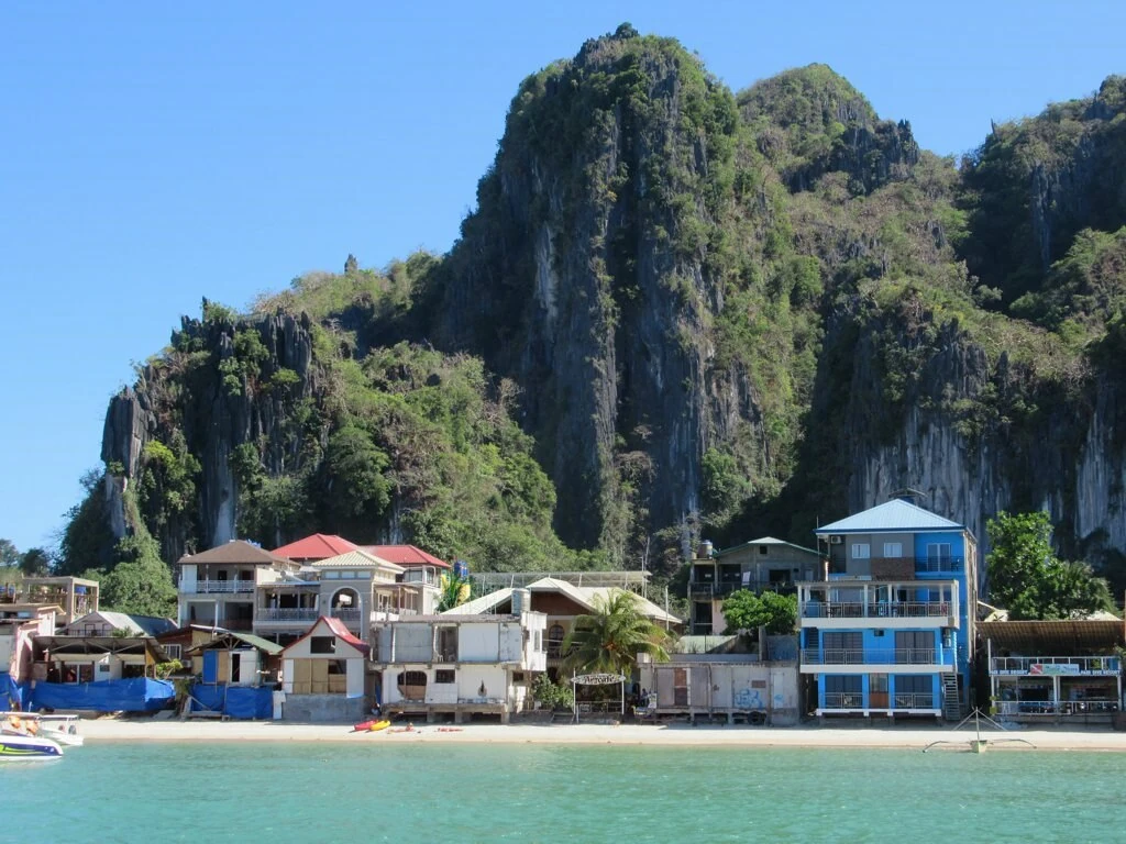 The sheer limestone of Taraw Cliff soars above El Nido, Palawan, the Philippines.